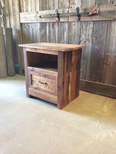 a wooden table with two drawers on it