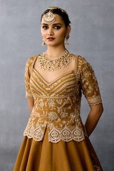 Ochre lehenga with thread, sequin embroidery in floral pattern. Paired with sweetheart neck peplum blouse and cutwork border embroidered dupatta. - Aza Fashions Latest Blouse Patterns, Lehenga Designs Latest, Pola Blus, Long Blouse Designs, Latest Bridal Blouse Designs, Bridal Lehenga Designs, Latest Model Blouse Designs, Latest Bridal Dresses, Lehenga Blouse Designs