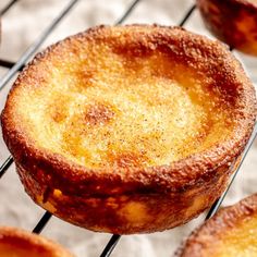 several baked desserts cooling on a rack