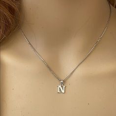 Description: 925 Sterling Silver Mini Small Initial Letter N Pendant Necklace Item No.: H89.Q Metal Type: 925 Sterling Silver (Available In 10k And 14k Gold) Metal Color: Silver Height With Bale: 15 Mm Width: 4.8 Mm Italian Rolo Chain In 16", 18", 20", 22" Available In Another Listings In Any Letter A-Z N Initial Necklace, Letter K Necklace, N Necklace, J Necklace, Shine Jewelry, North Star Necklace, Rectangle Necklace, Small Necklace, Symbol Necklace