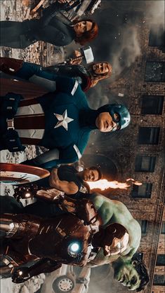 the avengers are standing in front of each other