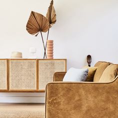 a living room filled with furniture and decor