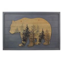 a wooden bear with trees on it