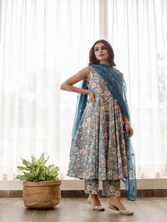 Trendroots offers the best deal for designer, Kusha - Blue Floral Printed Cotton Anarkali Set (Set of 3) with the highest quality and affordable price. Diwali Blue Cotton Silk Anarkali Set, Blue Bollywood Palazzo Set With Dupatta, Blue Anarkali Palazzo Set In Cotton Silk, Blue Unstitched Palazzo Set For Transitional Season, Blue Cotton Silk Salwar Kameez With Sheer Dupatta, Blue Anarkali Style Cotton Silk Palazzo Set, Blue Anarkali Palazzo Set For Festive Occasions, Blue Anarkali Set With Sheer Dupatta For Navratri, Blue Cotton Silk Kurta For Navratri