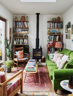 a living room filled with furniture and a fire place