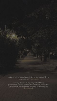 an image of a dark street with trees on both sides and a poem written in the middle