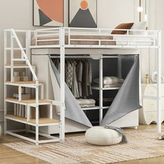 a white loft bed with stairs leading up to it