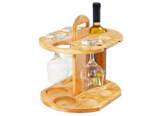 PRICES MAY VARY. Natural Bamboo: Our wine storage rack is made from strong and natural bamboo which adds a natural touch to your home, office, or restaurant. Elegant Design: This tabletop bottle holder is for inside or outside use. It's lightweight and durable. It holds 2 bottles and 4 glasses. Easy Care: To clean it, hand-wash it with hot soapy water and a cleaning cloth. Wipe with a dry cloth to dry. Never put it into a dishwasher or submerge it. Minimal assembly required: All accessories are Small Wine Rack, Small Wine Racks, Wine Rack Storage, Wine Sale, Wine Bottle Rack, Wine Glass Rack, Glass Rack, Glass Holder, Bottle Rack