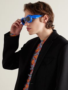 Loewe often experiments with different shapes and proportions, like the inflated acetate frames on these sunglasses. Made in Italy, they have dark-grey lenses and the brand's logo stamped along the arms. Modern Blue Acetate Sunglasses, Inflated Sunglasses, Kong Movie, Round Eyewear, Summer Sunglasses, Acetate Sunglasses, Sunglasses For Men, Fine Jewelry Designers, Loungewear Shorts