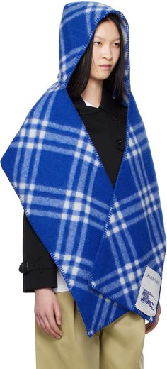 Felted woven wool hood-style scarf in blue and gray. · Jacquard check pattern throughout · Logo patch at end · Blanket stitching at edges · H12 x W77 Supplier color: Knight Hooded Scarf Pattern, Plaid Accessories, Hood Style, Distinguished Gentleman, Style Scarf, Hooded Scarf, Burberry Women, Scarf Pattern, Wool Scarf