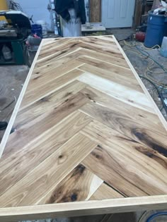 a wooden table being built in a garage