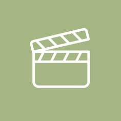 a green background with a white outline of a movie clapper on top of it