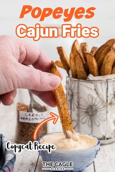 a person dipping some bread sticks into a bowl of dip with the caption popes cajun fries