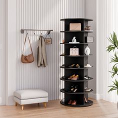 there is a black shelf with shoes on it in the corner next to a white chair