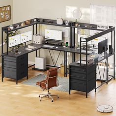 an office with two desks and a chair in the middle of the room,