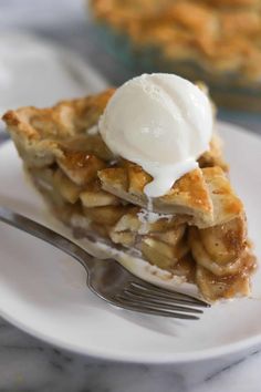 an apple pie on a white plate with a fork and text overlay that reads easy all - american apple pie