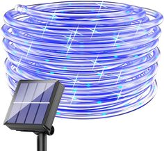 a solar powered garden light with blue lights