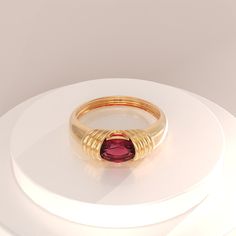 Majestic Garnet Ring for Women with Yellow White Rose Color Options. Bold and Chunky Design Oval January Birthstone Dome Statement Ring. This Dainty Red Gemstone Bubble Ring is designed by Norm Jewels to take your style one step further.   Ring Details   ❥ Gold KT: 14k 18k 10k Solid Gold   ❥ Gold Color Options: Yellow Gold, White Gold, Rose Gold   ❥ Bottom Width: 1.30 mm   ❥ Top Width: 5.75 mm   ❥ Thickness: 1.35 mm   ❥ Gemstone: Natural Garnet   ❥ Ready to Ship 4-7 Business Days   MORE FROM US Garnet Stone Ring, Red Gemstone Ring, Bubble Ring, Red Gemstones, January Birthstone, Garnet Ring, Garnet Stone, Ring Dainty, Garnet Rings