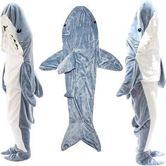 three shark costumes are shown in three different poses