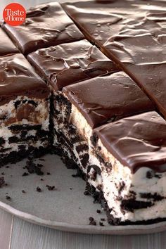 a close up of a cake on a plate with the words icebox cookie cheesecake