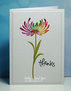 a handmade thank card with flowers on it