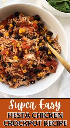 a white bowl filled with shredded chicken and black beans