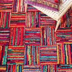 multicolored rugs are arranged on the floor