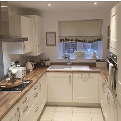 the kitchen is clean and ready for us to use in its new owner's home