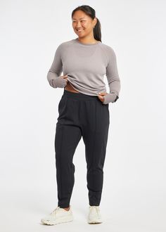 Meet your new daily staple. She's just as hardworking and multitasking as you are. A high-rise, relaxed fit jogger, the Plya Track Pants are structured enough for the office and technical enough for you to run home in them if the mood strikes. Made from Power Plya fabric, the sporty yet elevated details signal that while you may be many things, you're always a runner. Team Training, Fitted Joggers, Outerwear Vest, Shorts With Tights, New Tops, The Mood, Short Tops, Track Pants, The Office