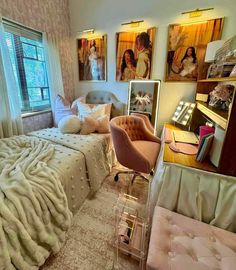 a bed room with a neatly made bed and pictures on the wall