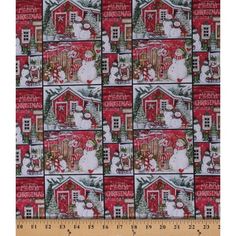 a red and white christmas fabric with snowmen in front of a house on it