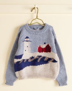 Our Highland Lighthouse Sweater is inspired by a hand-knit sweater from the 1980s. The reference sweater was knit by a Truro, Massachusetts resident to benefit the preservation of a local arts center. This sweater is made on hand looms at a woman-owned and -operated factory in Peru. The intarsia design is by Lynne & Cow Knit Sweater, Scandinavian Fashion Women Winter, Oversized Knitted Sweaters Pattern, Funky Knit Hats, Vintage Knit Sweater Pattern, Knit Graphic Sweater, Vintage Knit Sweaters, Crochet Moon Sweater, Cozy Crochet Sweater