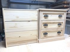 two wooden drawers sitting next to each other