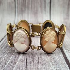 Vintage Yellow Gold Cabochon Bracelets, Collectible Yellow Gold Bracelets, Formal Oval Intaglio Bracelet, Antique Oval Cameo Bracelet, Oval Cameo Bracelet For Formal Occasions, Antique Cameo Jewelry, Cameo Bracelet, Antique Costume Jewelry, Cameo Jewelry