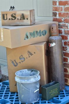 boxes and buckets are stacked on top of each other