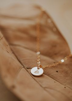 A tiny circle charm necklace hand-stamped with a little symbol on a delicate 14kt Gold Fill chain necklace. Poppy Ring, Everyday Wear Jewelry, Dot Necklace, Layered Chains, Mothers Necklace, Hand Stamped Jewelry, Engraved Jewelry, Stamped Jewelry, Personalized Necklace