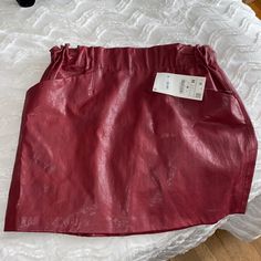 Zara Red Leather Skirt. Brand New With Tags Never Worn Chic Red Mini Skirt For Fall, Chic Burgundy Lined Skirt, Chic Burgundy Skirt For Spring, Chic Burgundy Skirt For Night Out, Trendy Red Skirt With Pockets, Casual Burgundy Summer Skirt, Chic Burgundy Skirt, Spring Burgundy Mini Skirt, Red Zara Mini Skirt For Spring