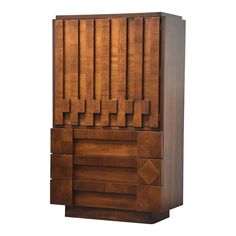 a tall wooden cabinet with many drawers