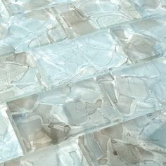 a close up view of some glass tiles