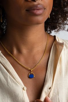 Inspired by ancient intaglios, this highly saturated lapis can be inscribed on both sides and its ridge for you to make your own mark. Cradled in an arch of 22K, the indigo stone can be rotated as you wear it, allowing you to choose the message you wish to send. 22K Yellow Gold + Lapis Chain sold separately Made in NYC Cap Rising, Crown Hairstyle, Intaglio Jewelry, Garden Clogs, Knit Outerwear, Black Crane, Flower Crown, Jewelry Sales, Accessories Shop