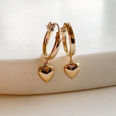 Dangle Heart Hoop Earrings - Gold Filled - Adorned by Ruth Heart Earrings Gold, Heart-shaped Dangle Earrings With Charms, Gold Dangle Huggie Earrings With Heart Charm, Everyday Dangle Earrings With Heart Charm, Everyday Heart Charm Dangle Earrings, Dainty Tarnish-resistant Huggie Heart Earrings, Everyday Huggie Earrings For Valentine's Day, Gold Nickel-free Huggie Heart Earrings, Gold Huggie Heart Earrings Nickel Free