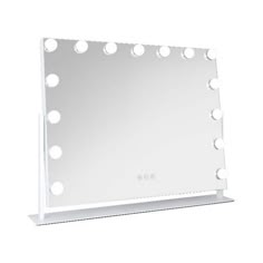 a white vanity mirror with lights on it