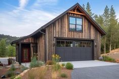 a large wooden house with two garages on the side