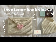 a crocheted bag with a pink heart on the front, and an envelope in the back