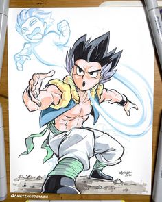 a drawing of gohan from dragon ball is shown on a table next to markers and pens