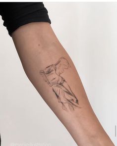 a woman's arm with a tattoo design on the left side of her body