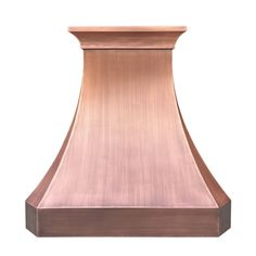 a copper range hood on a white background with the light reflecting off it's side