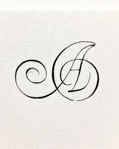 the letter d is made up of black ink on white paper with an artistic swirl