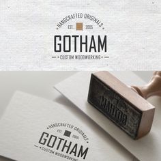 a rubber stamp with the word gotham on it and an image of a wooden handle