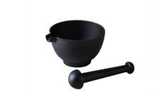 a black bowl and spoon on a white background